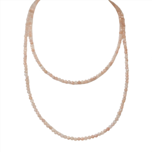 Peach Moonstone 31" faceted necklace and multi-wrap bracelet featuring calming and intuitive properties.