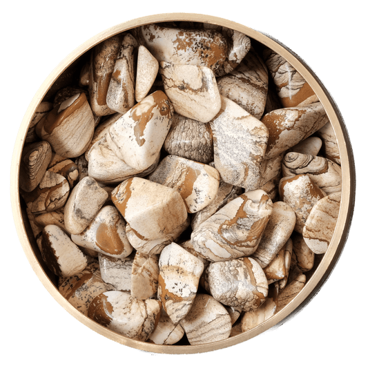 Picture Jasper tumbled stones in a bowl, promoting balance, harmony, and emotional release.