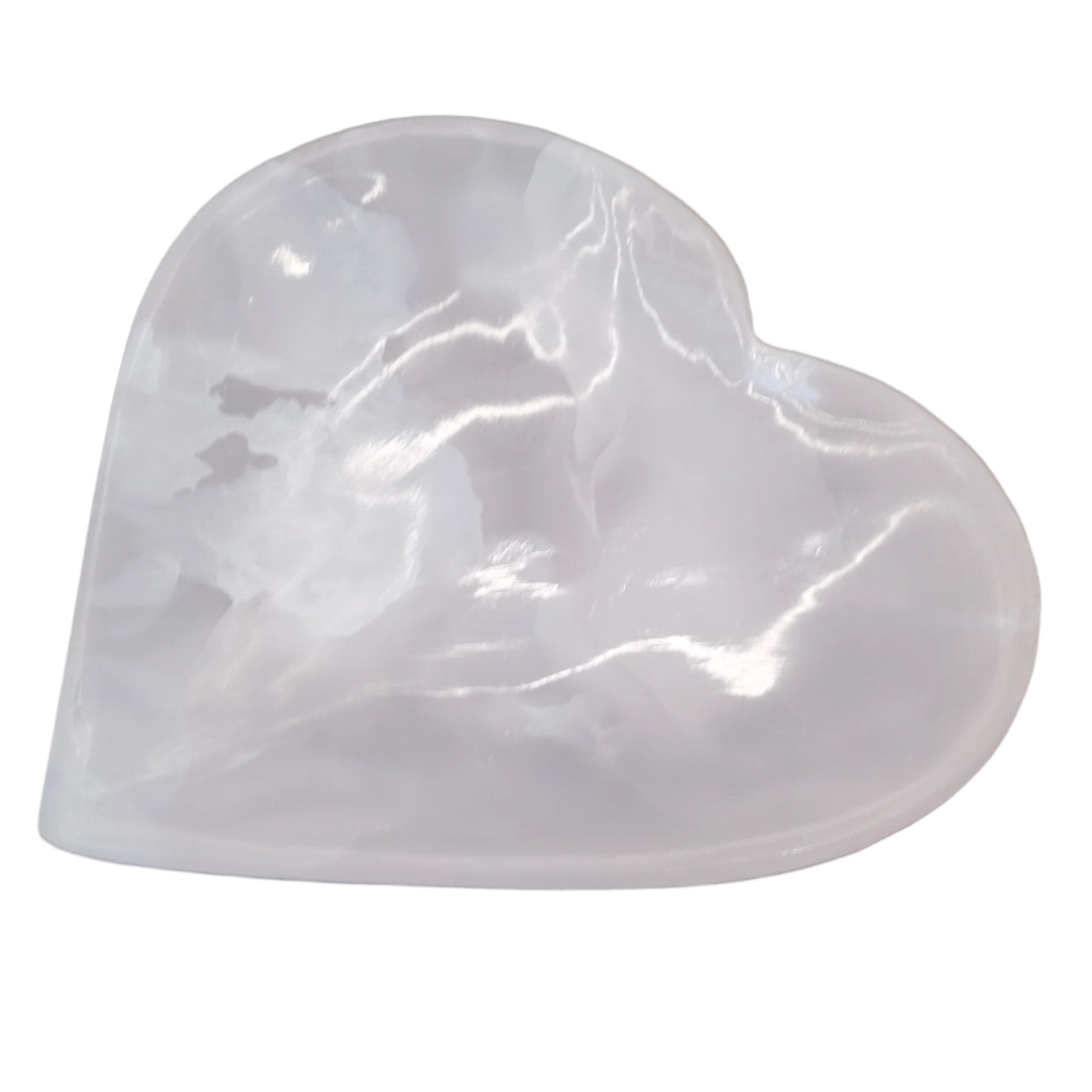 Heart-shaped pink calcite plate, smooth surface, perfect for decor or gifting, enhances ambiance and tranquility.