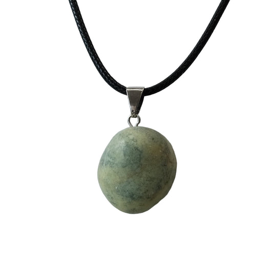 Serpentine tumbled stone pendant necklace on black cord for meditation and healing energy.