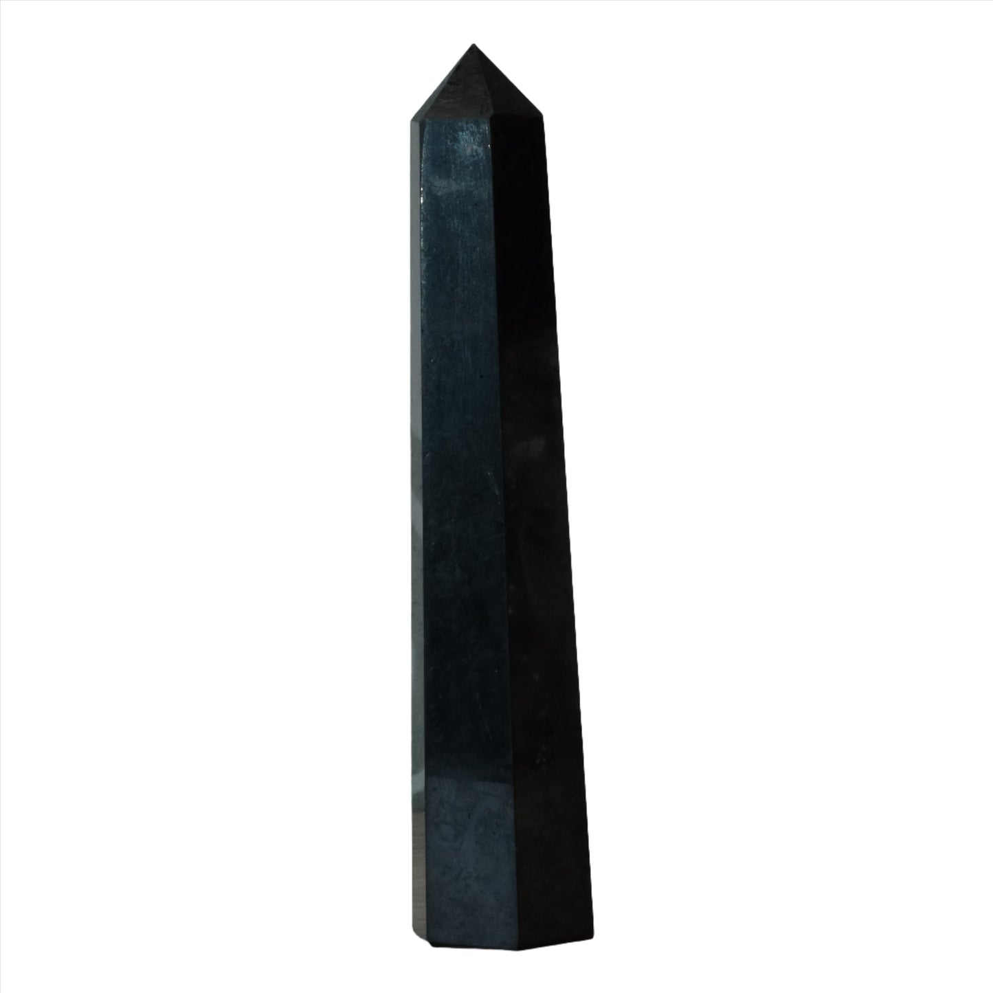 Shungite tower 3-4 inches tall, known for antioxidant and EMF shielding properties. Ideal for wellness and decor.