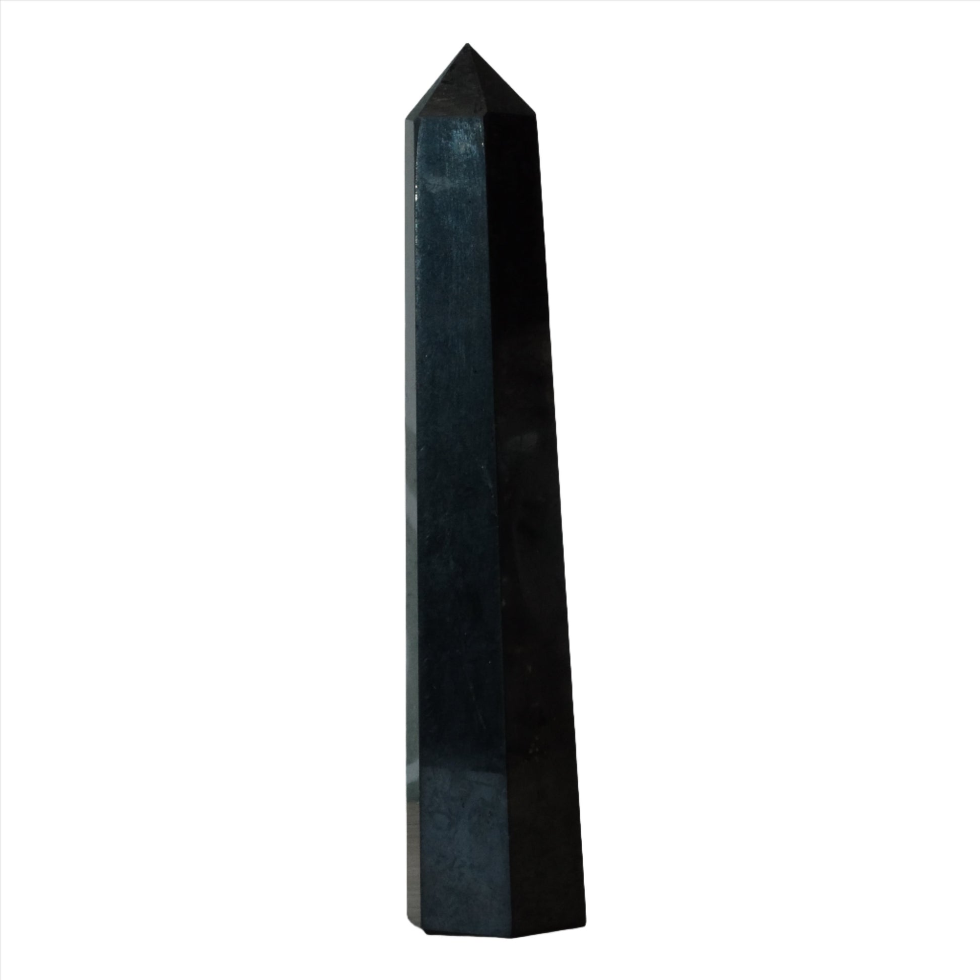 Shungite tower 3-4 inches tall, known for antioxidant and EMF shielding properties. Ideal for wellness and decor.