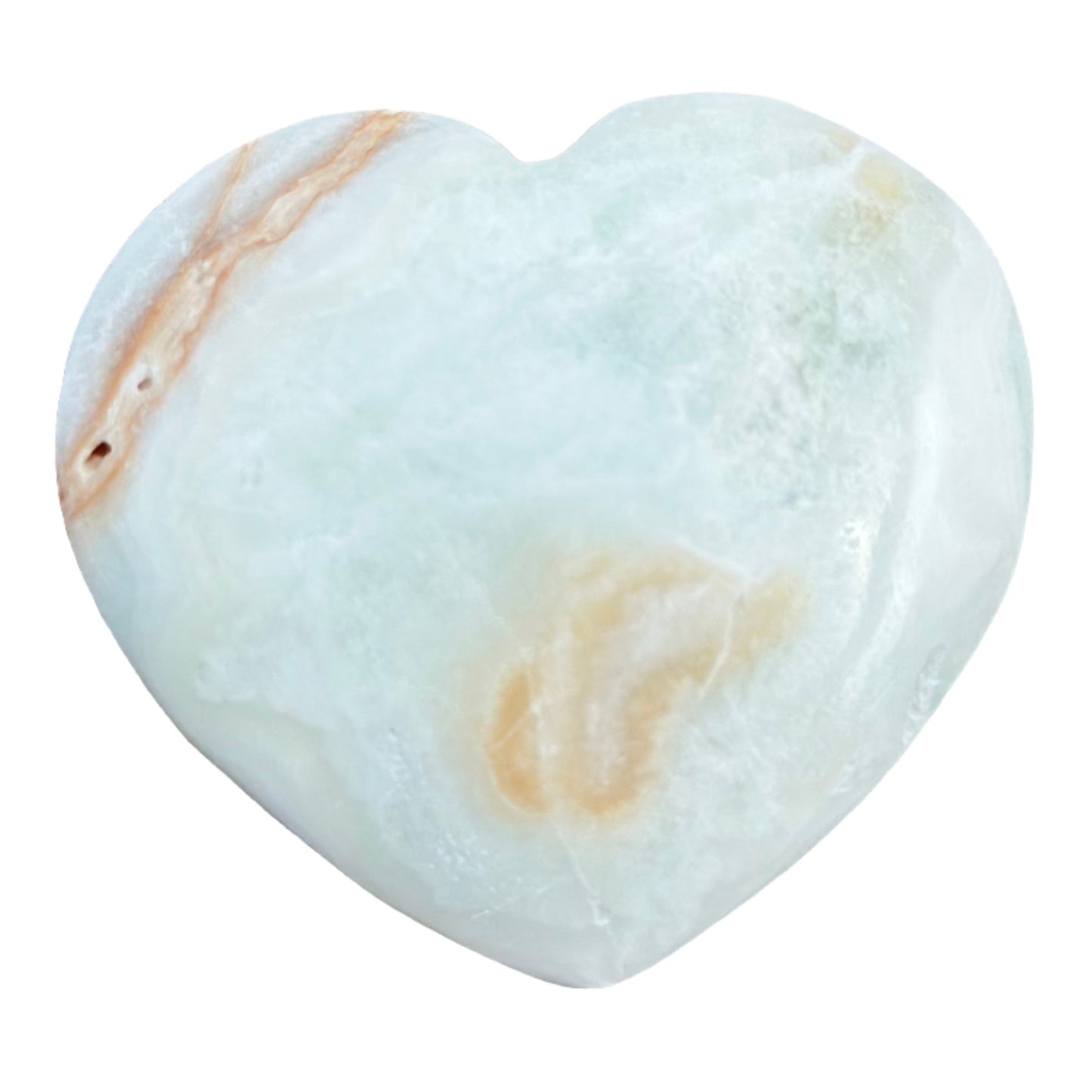 Caribbean calcite heart stone promoting serenity and personal growth with natural colors and smooth surface.