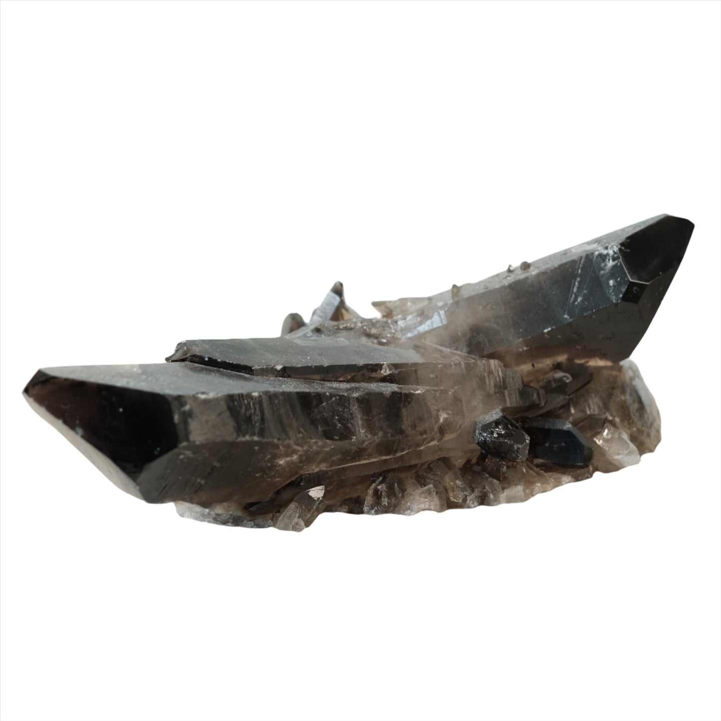 Smoky Quartz Cluster crystal for grounding and neutralizing negative energy, promoting peace, stability, and well-being.