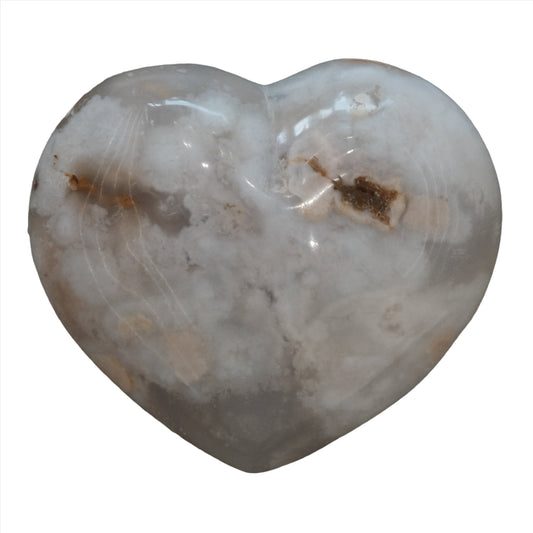 Heart-shaped Flower Agate crystal weighing 218g, showcasing light pink hues and delicate inclusions for healing and relaxation.