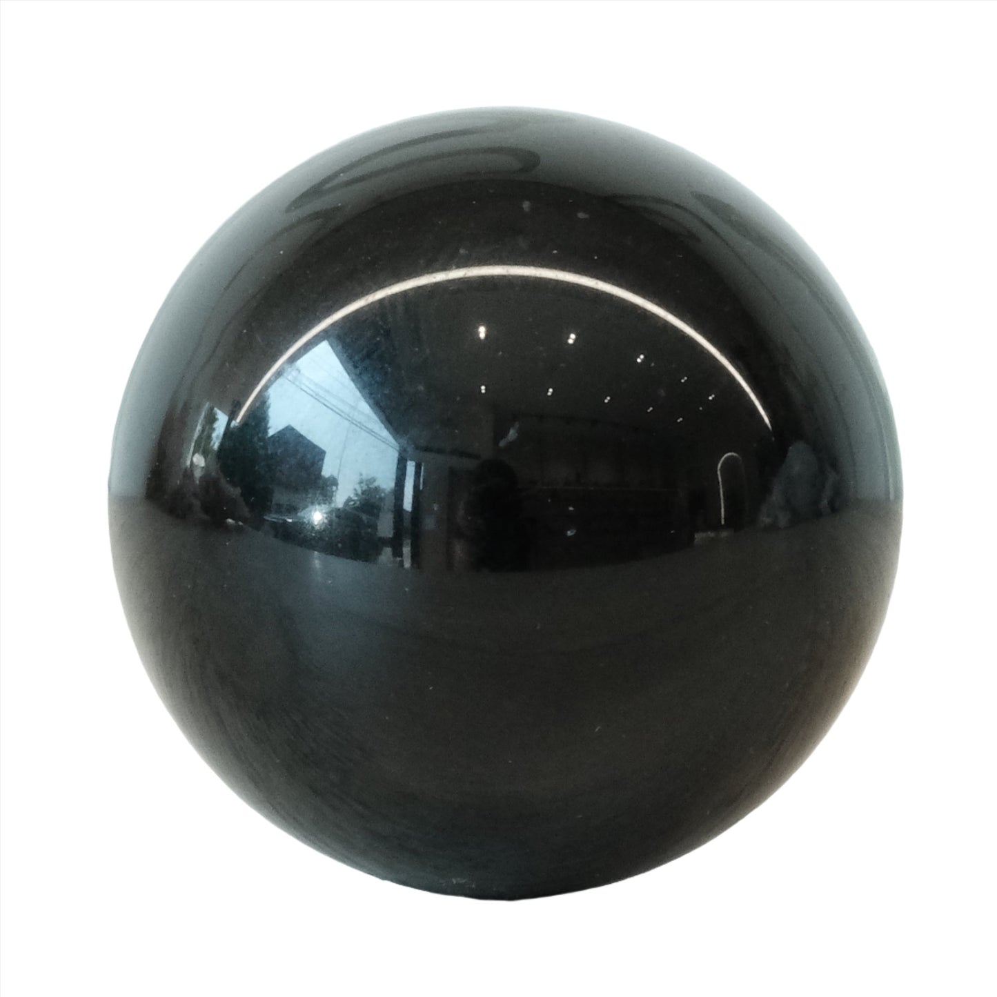 Small black obsidian sphere showcasing its smooth, glossy surface and reflective properties, ideal for decor or crystal healing.