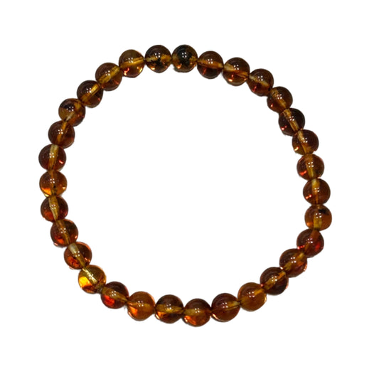 Amber adult bracelet with 4-6mm beads for stress relief, healing, and rejuvenation, absorbing negative energy and aiding cognitive balance.