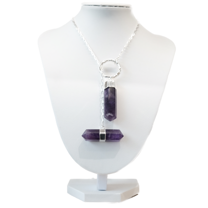 Amethyst Point Necklace on display bust, features double gemstone points promoting stress relief and spiritual clarity.