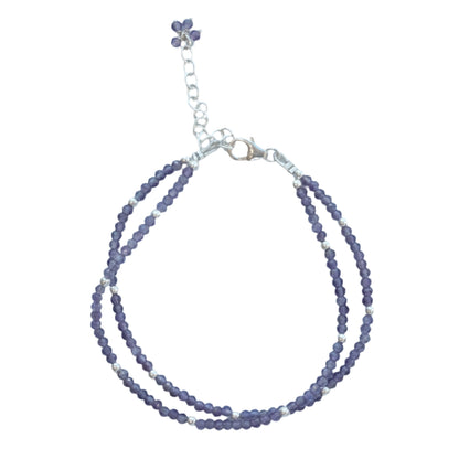 Amethyst faceted double strand bracelet with sterling silver clasp, promoting stress relief and enhanced clarity.