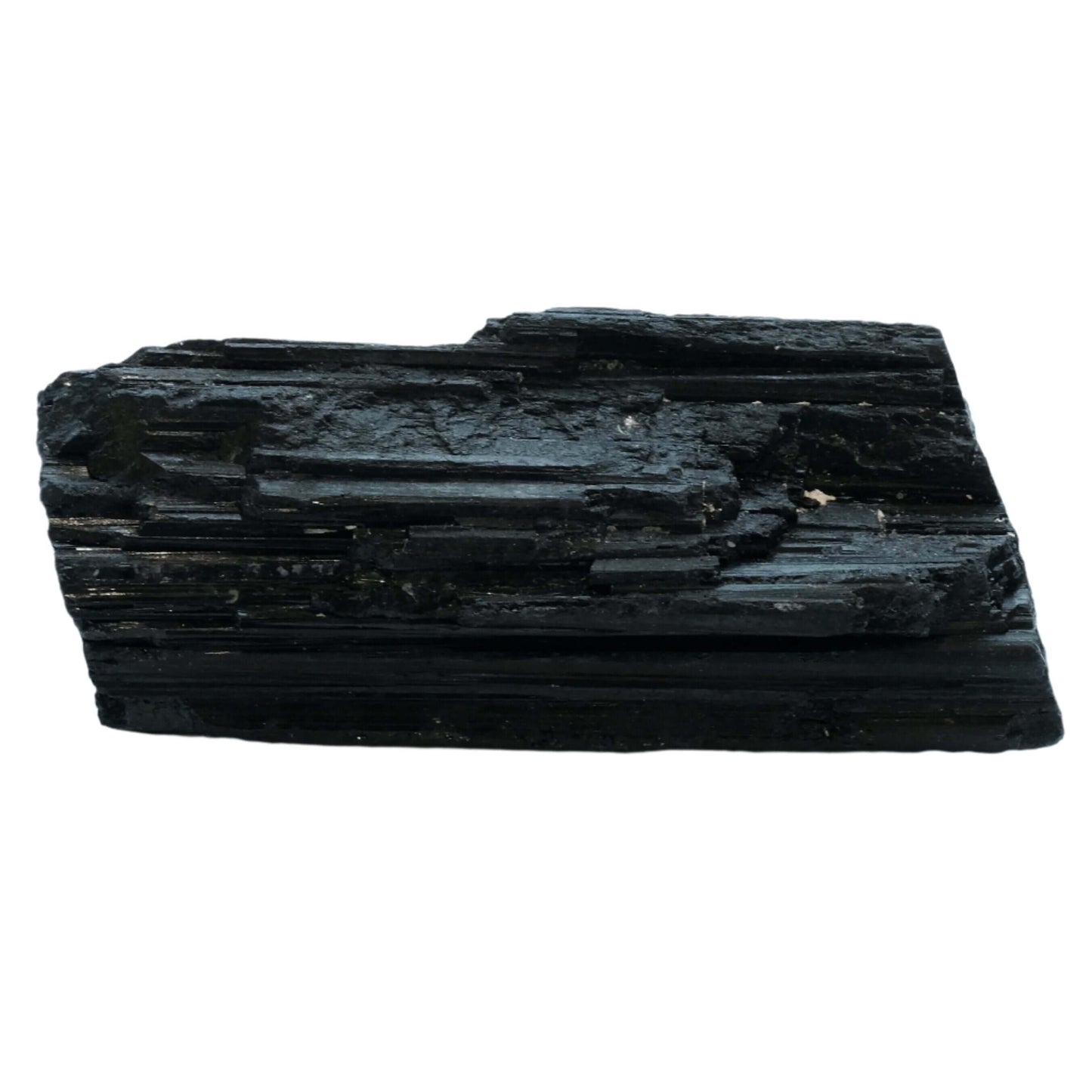 Rough large black tourmaline stone for energy protection and grounding.