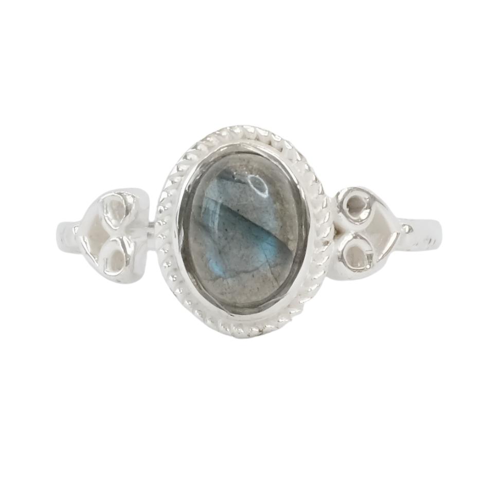 Labradorite oval adjustable sterling silver ring enhances intuition and provides strength, featuring a polished gemstone center.