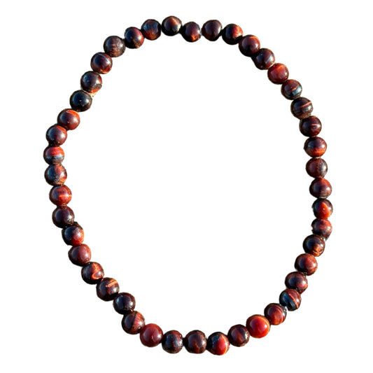 Red tiger eye bracelet with 4MM beads, ideal for grounding and reducing stress, featuring a stylish and timeless design.