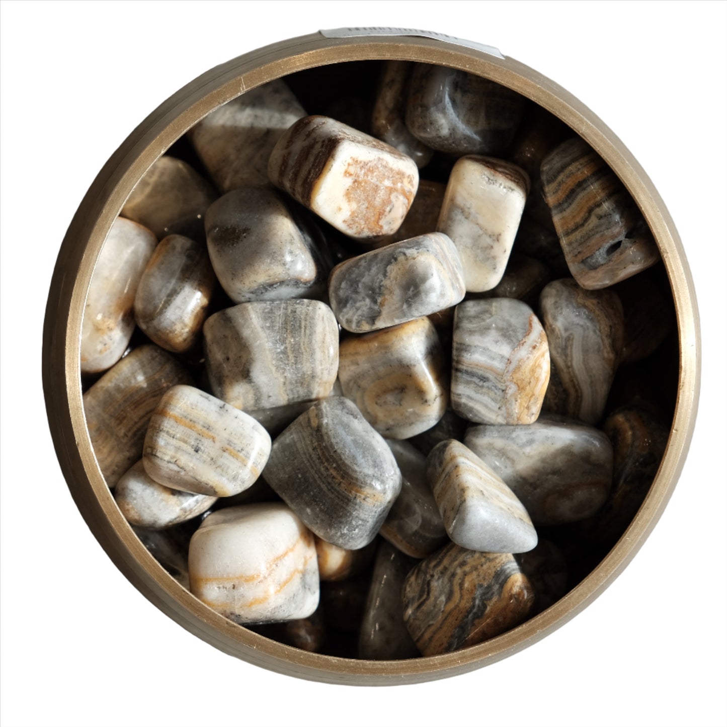 Bowl of polished striped onyx tumbled stones showcasing natural patterns and earthy colors.