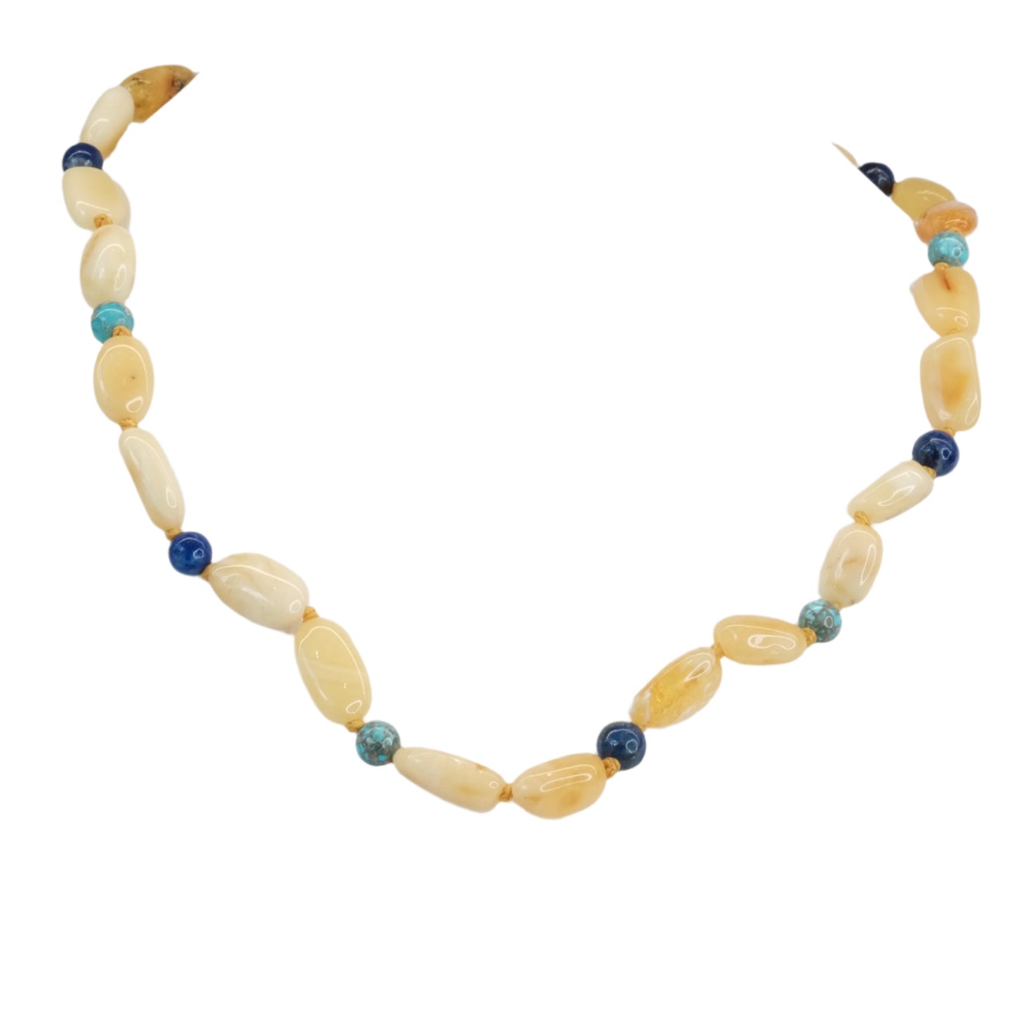 Children's amber necklace with turquoise and lapis lazuli beads, offering healing and balanced energy benefits.