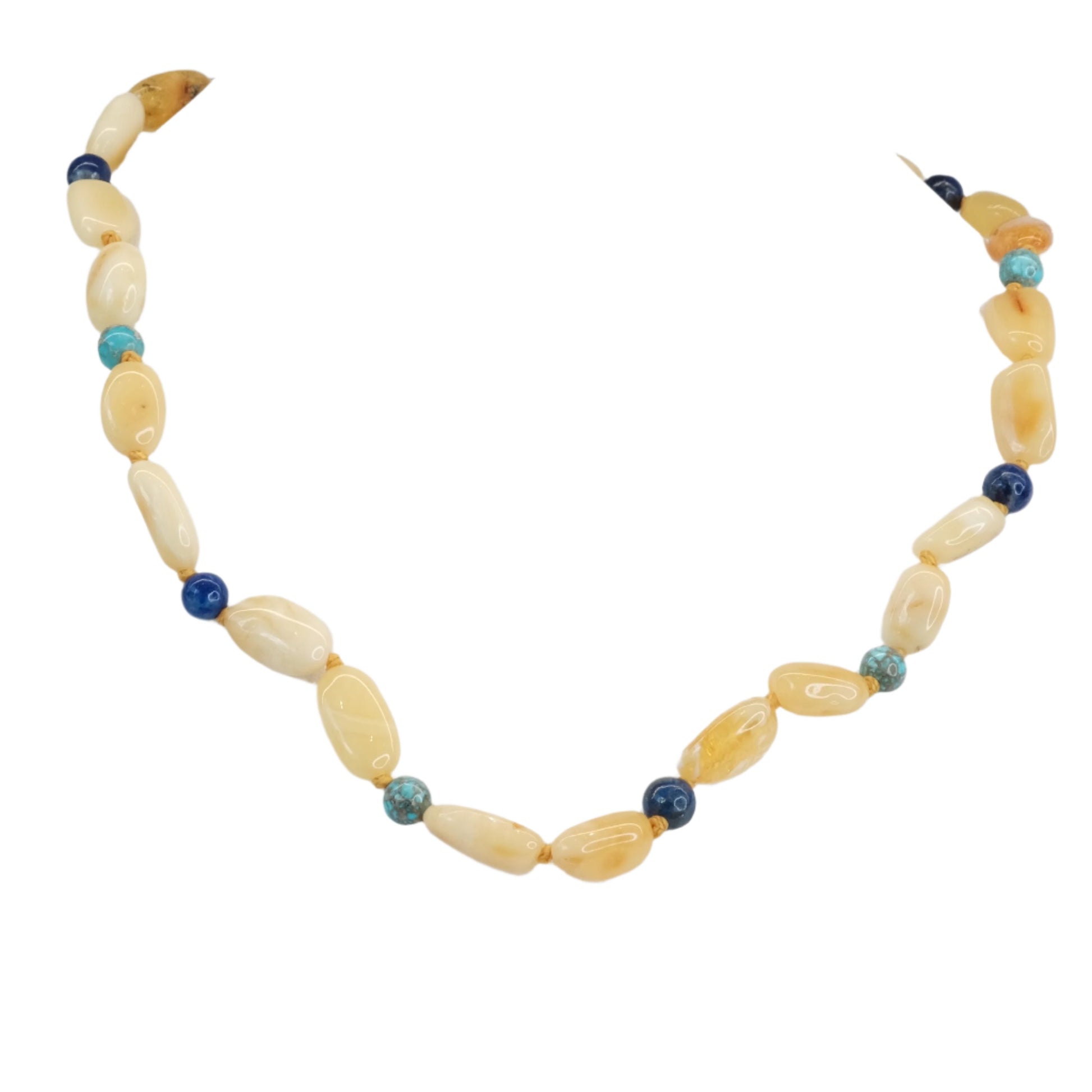 Children's amber necklace with turquoise and lapis lazuli beads, offering healing and balanced energy benefits.