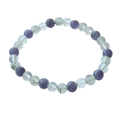 A beaded stretch bracelet featuring alternating translucent clear crystal beads and smooth purple round beads, displayed on a light gray background.
