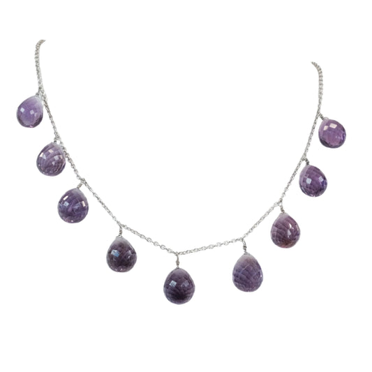 Amethyst sterling silver necklace with purple gemstones, promotes stress relief and spiritual clarity, enhances mood stability.