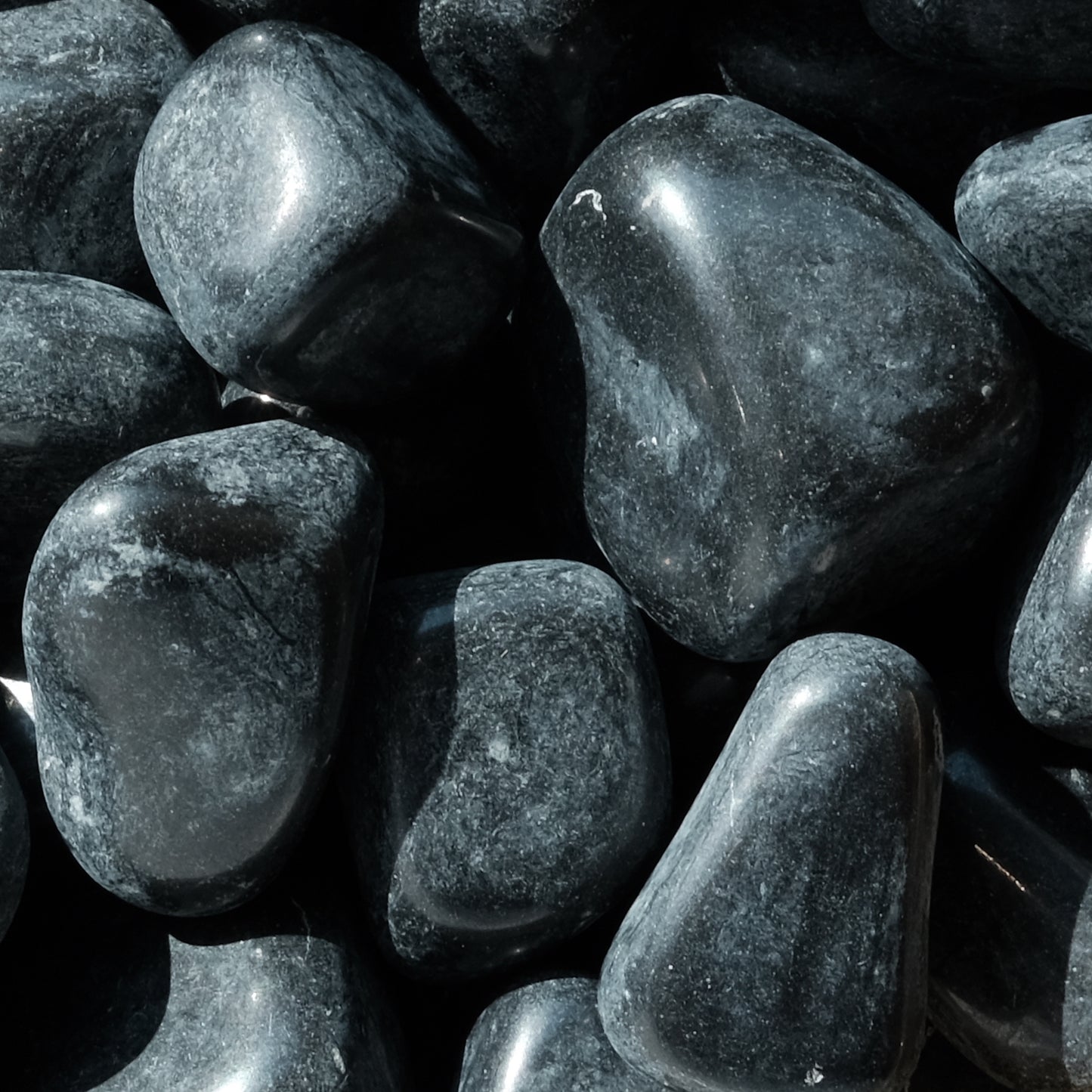 Black Tourmaline tumbled stones 20-30MM for cleansing, grounding, and protection against negative energies and radiation.