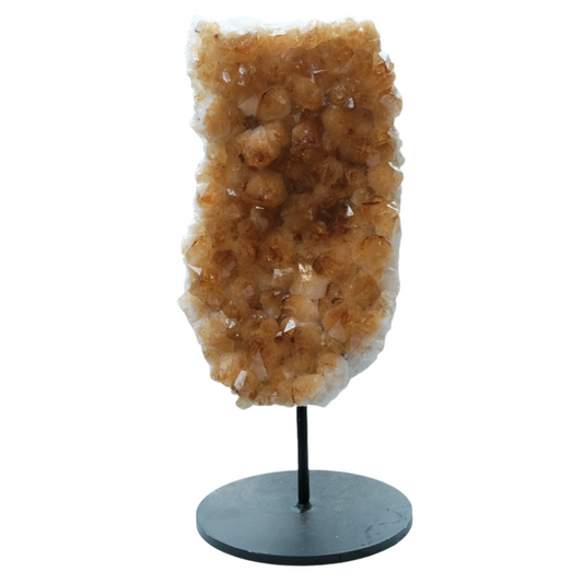 Citrine cluster on stand for energy, intuition, and prosperity, promoting joy and confidence.