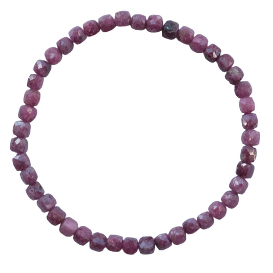 Ruby Cube Bracelet promoting confidence, joy, and positive energy with motivational and wealth-retention properties.