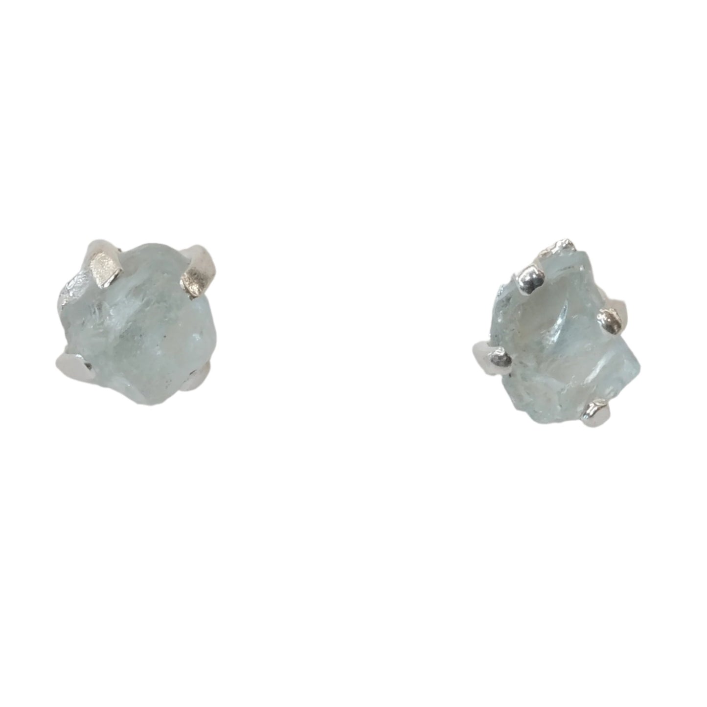 Aquamarine sterling silver earrings showcasing raw gemstone design promoting calm and courage.