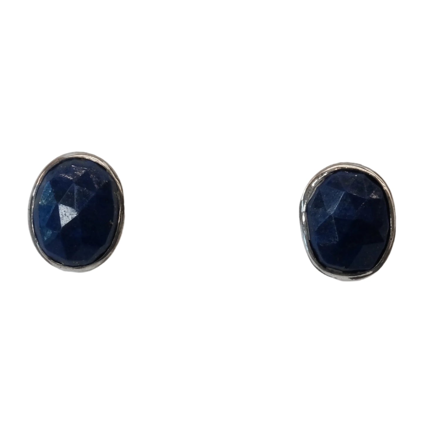 Lapis Lazuli sterling silver earrings showcasing deep blue gemstone in oval setting promoting calm and self-expression.