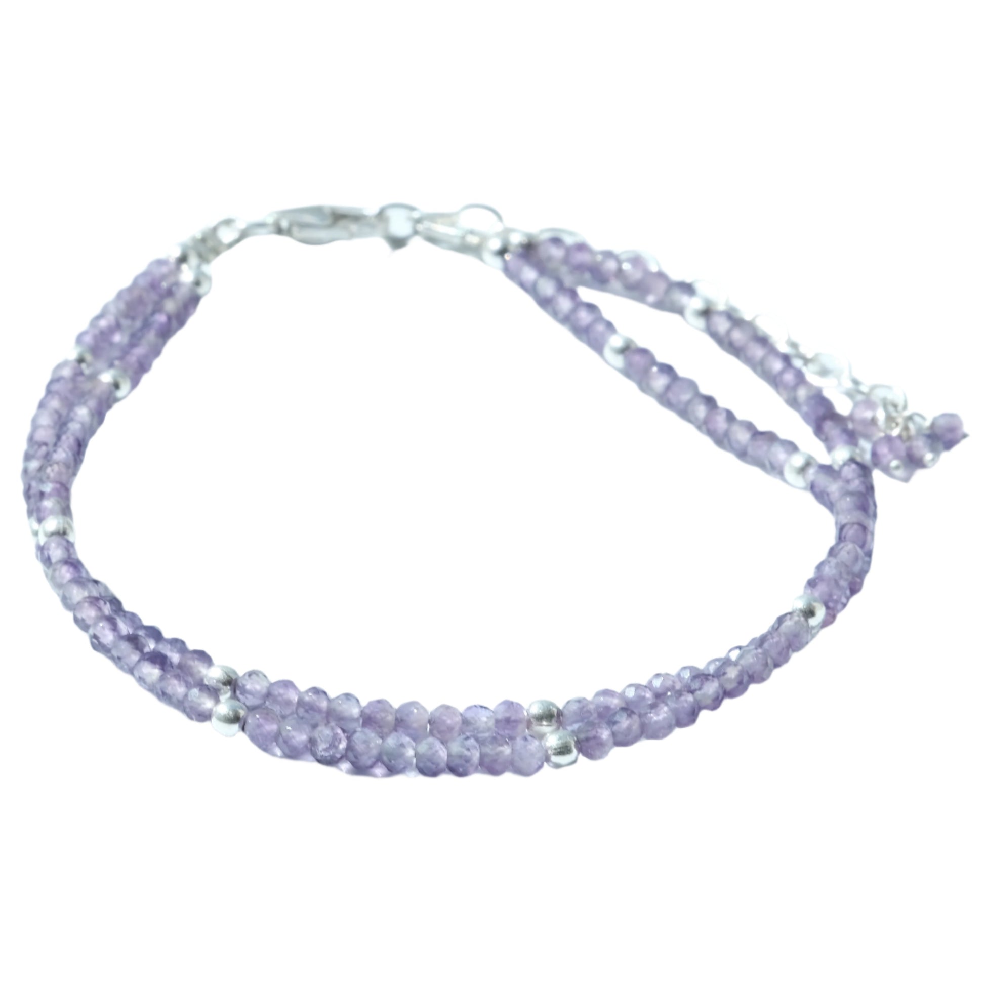 Amethyst faceted double strand sterling silver bracelet with calming and healing properties.