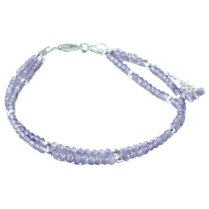 Amethyst faceted double strand sterling silver bracelet with calming and healing properties.