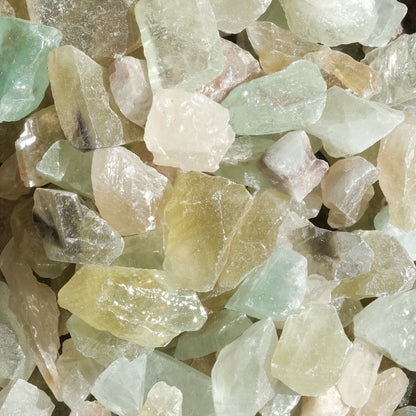 Raw green calcite stones promoting mental balance and new ideas. Ideal for children and reducing anger. Suitable for heart energy work.