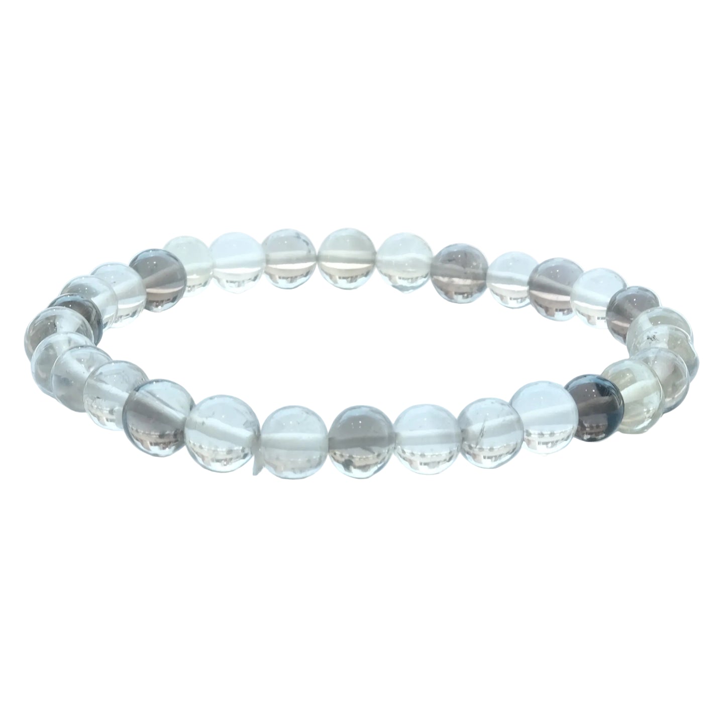 A beaded stretch bracelet made of clear, round glass or crystal beads with some translucent gray and dark gray accents, displayed on a light blue-white surface.
