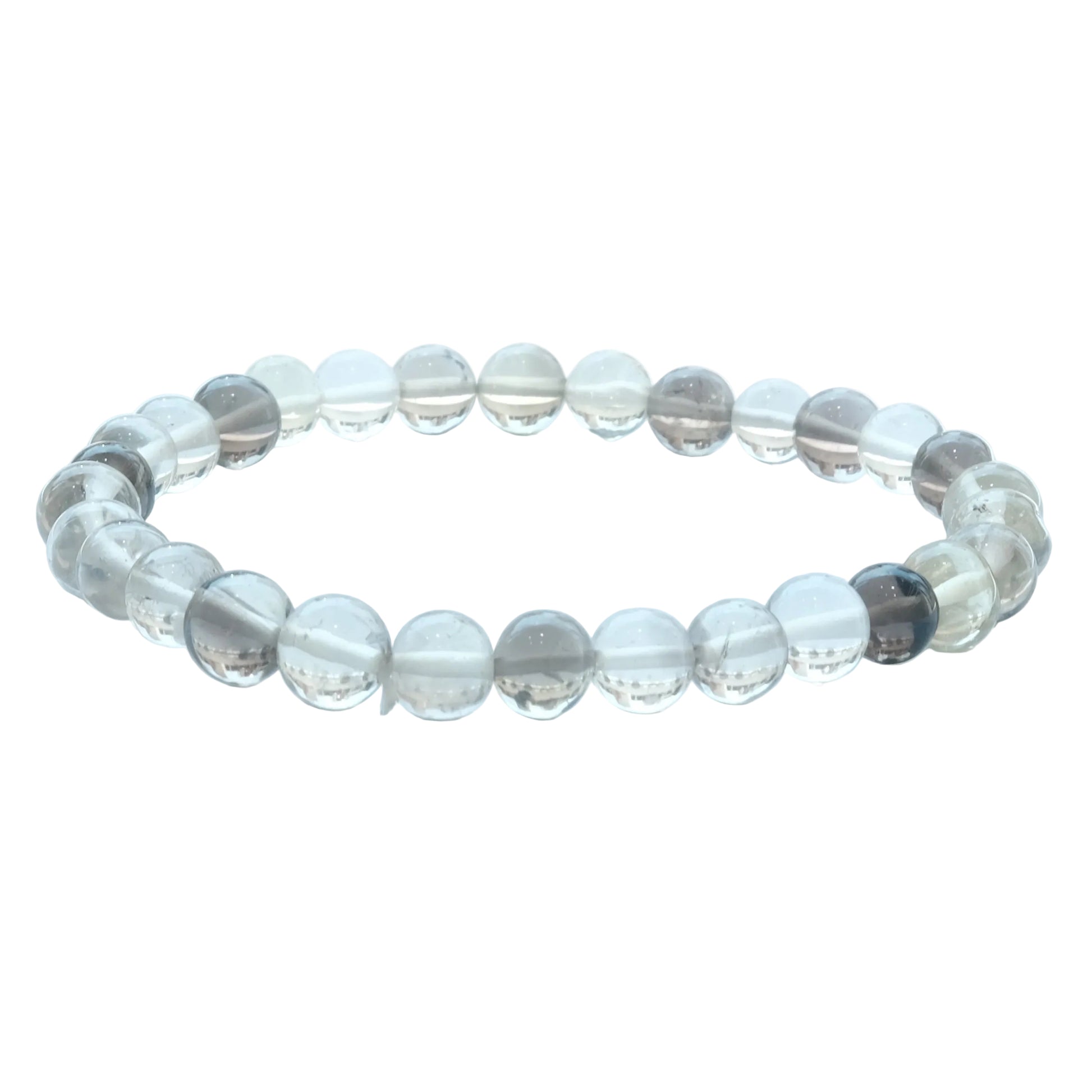 A beaded stretch bracelet made of clear, round glass or crystal beads with some translucent gray and dark gray accents, displayed on a light blue-white surface.