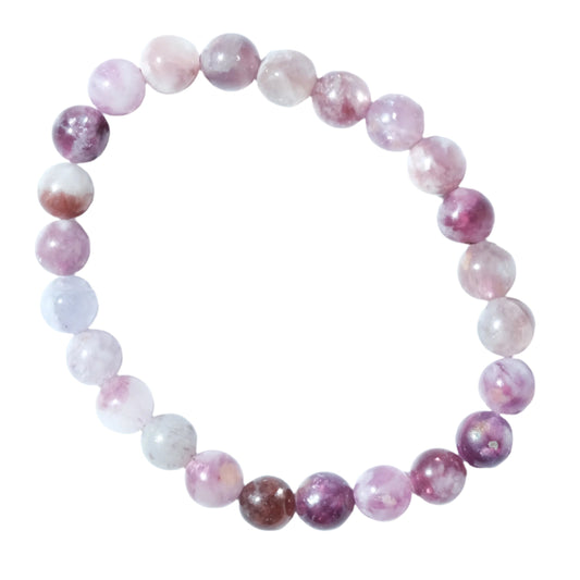 Lepidolite with mica bracelet featuring calming purple and pink stones to reduce anxiety and promote emotional balance.