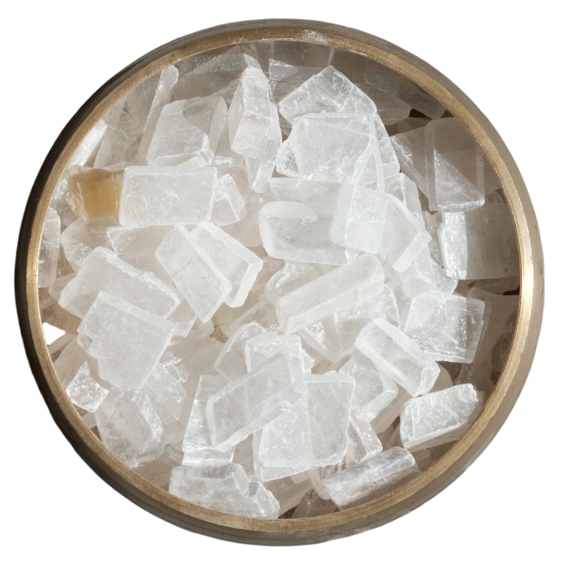 Optical Calcite Iceland Spar raw crystals in a bowl, known for clearing negative energy and enhancing spiritual connection.