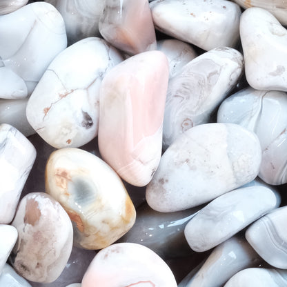 Pink Botswana Agate tumbled stones, known for encouraging creative thinking and aiding smokers with solutions-focused mindset.