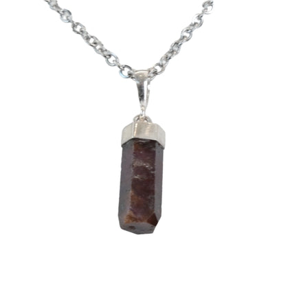 Ruby polished sterling silver pendant necklace, powerful gemstone jewelry promoting vitality, confidence, and positive energy.