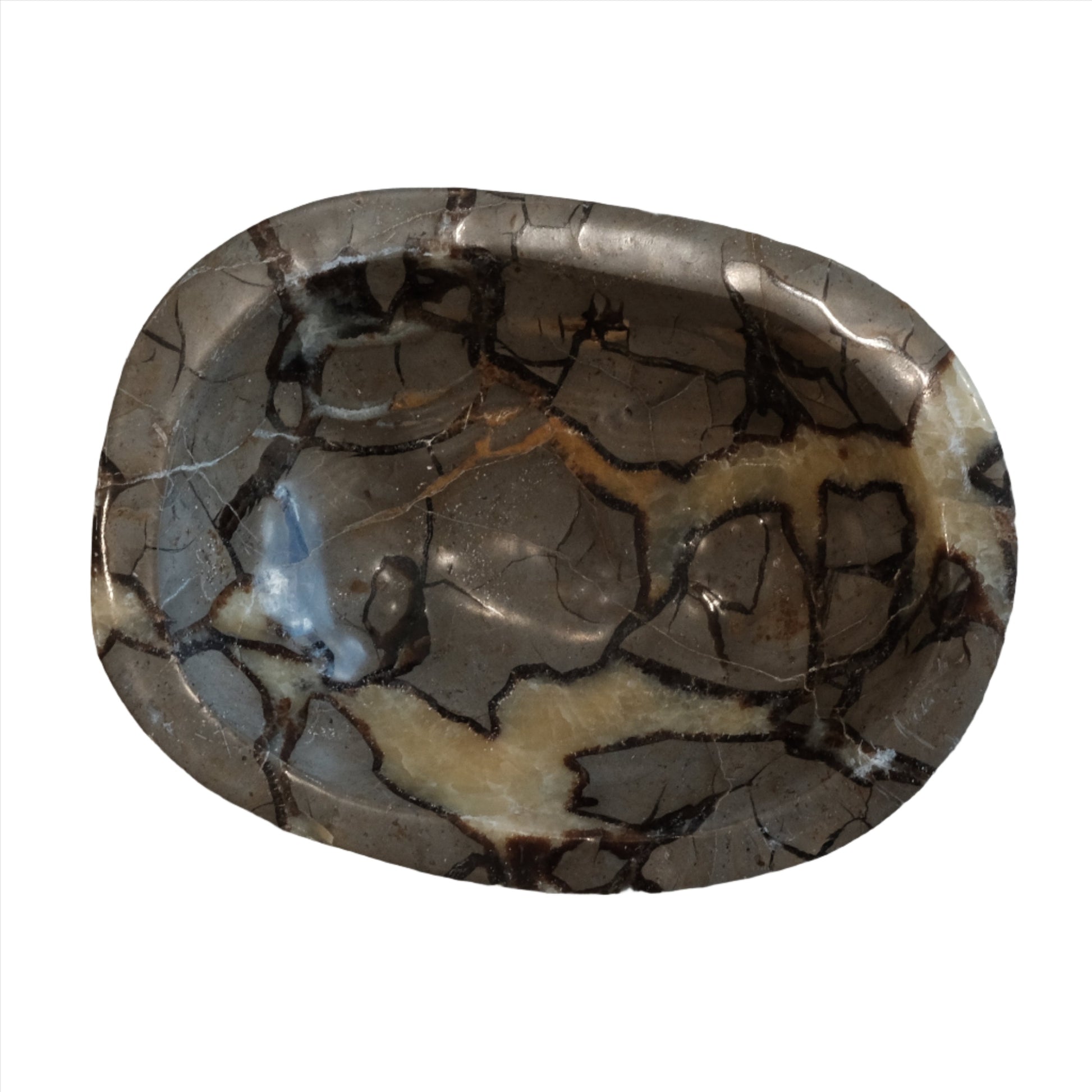 Septarian bowl featuring yellow calcite and brown aragonite, known for promoting communication, intuition, and stability.