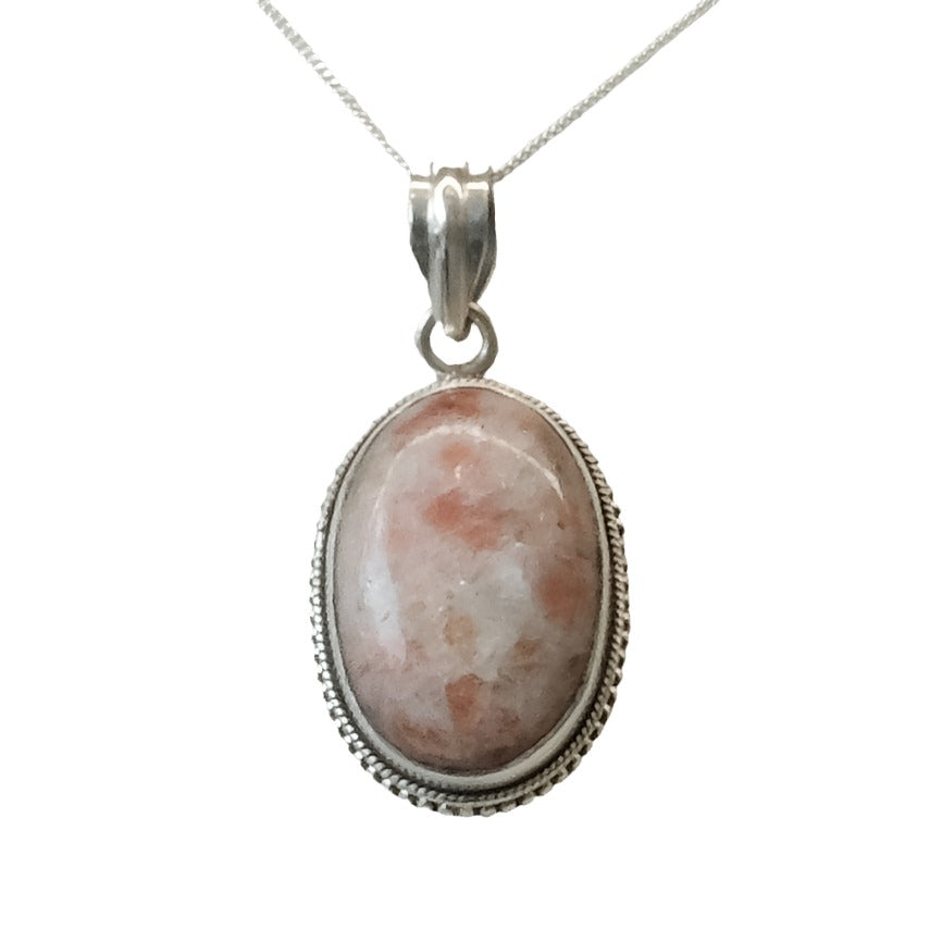 Sunstone sterling silver pendant necklace with oval gemstone for luck and good fortune.