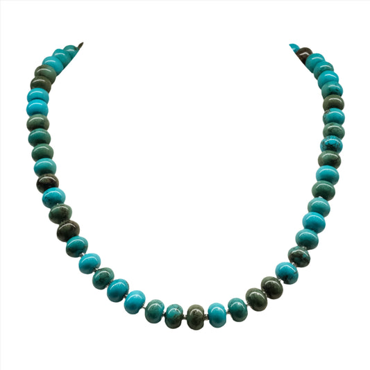 Turquoise necklace with magnetic clasp featuring vibrant blue and green beads on a white background.